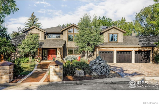 craftsman house with a garage