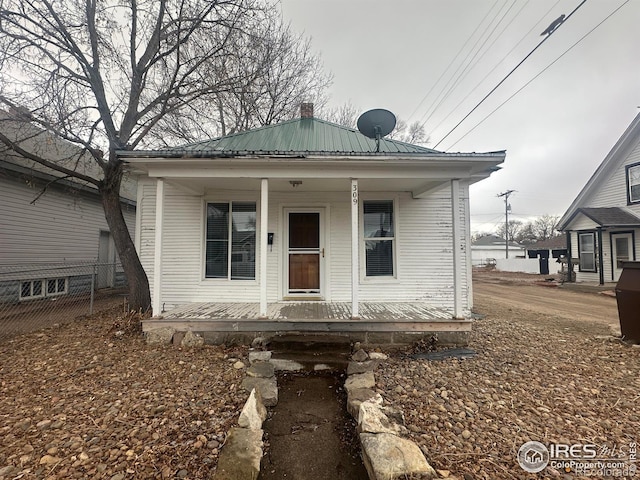 bungalow-style house featuring covered porch