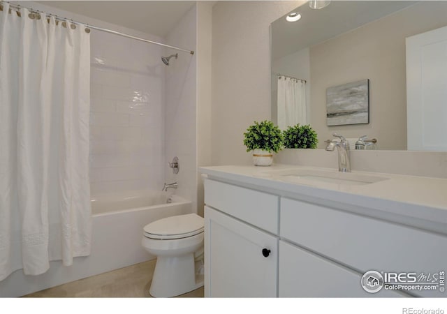 full bathroom with toilet, vanity, and shower / bathtub combination with curtain