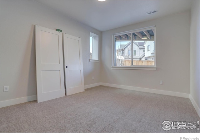 unfurnished bedroom featuring carpet flooring