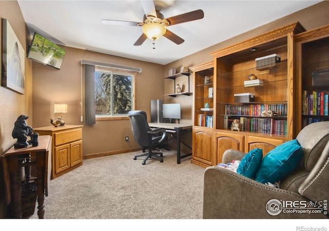 home office with light colored carpet and ceiling fan