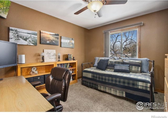 carpeted bedroom featuring ceiling fan