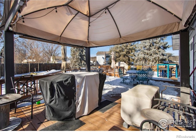 wooden terrace with a gazebo