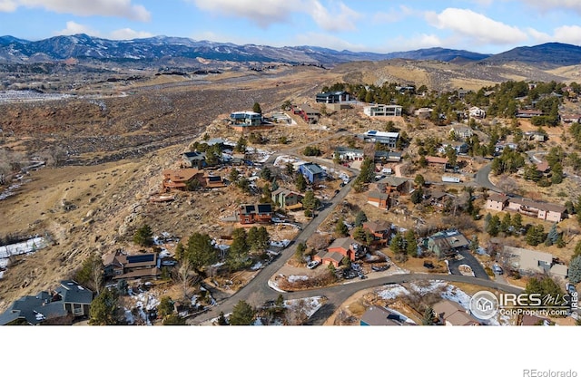 drone / aerial view featuring a mountain view