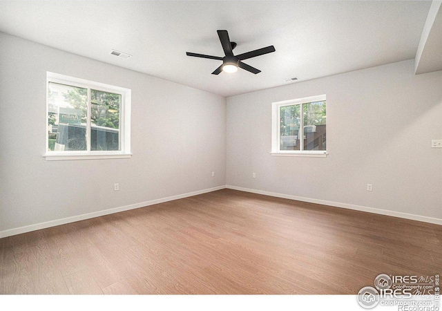 unfurnished room featuring wood-type flooring and ceiling fan