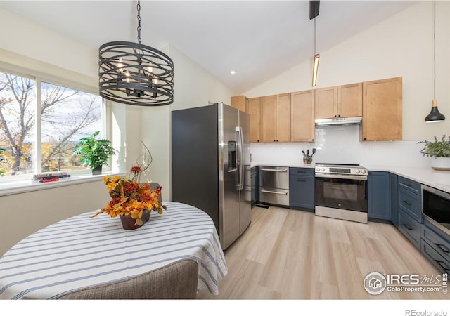 kitchen featuring stainless steel appliances, light countertops, light wood-style floors, under cabinet range hood, and decorative light fixtures