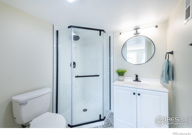 full bath featuring visible vents, toilet, a stall shower, and vanity