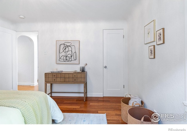 bedroom featuring hardwood / wood-style floors