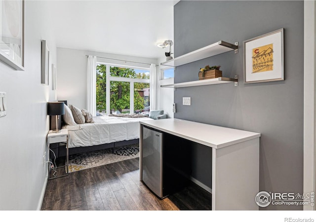 bedroom featuring dark wood-type flooring and wine cooler