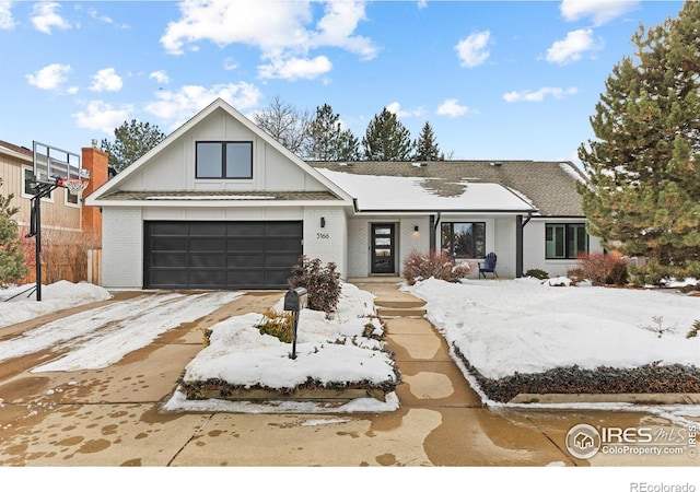 ranch-style home featuring a garage