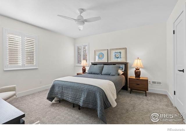 carpeted bedroom featuring ceiling fan