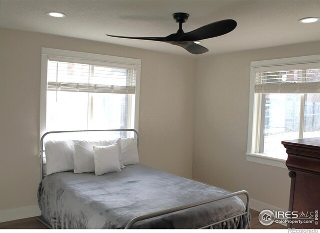 bedroom featuring ceiling fan