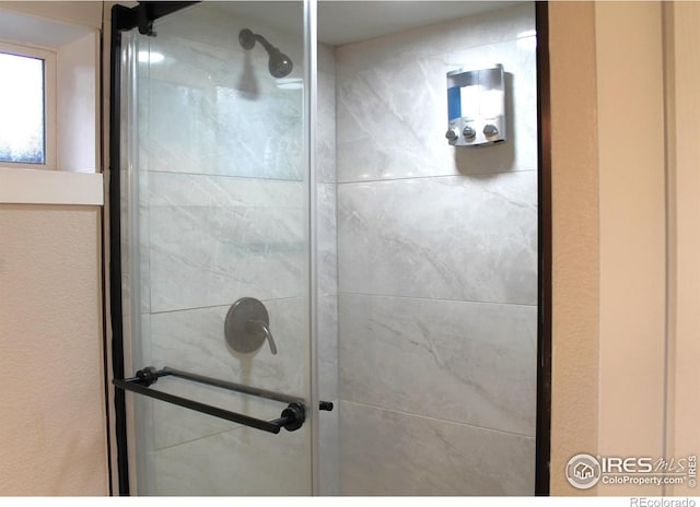 bathroom featuring walk in shower