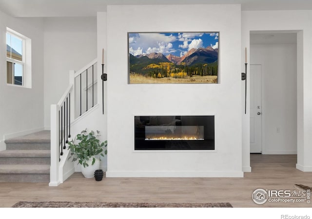 living room with light hardwood / wood-style floors