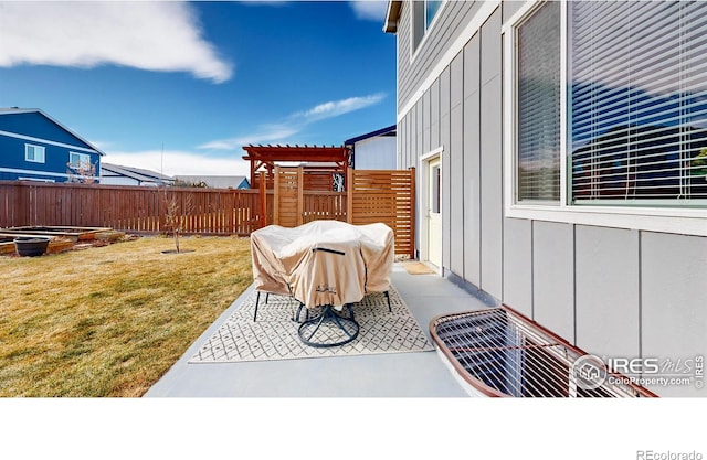 view of patio / terrace with a fenced backyard and a pergola