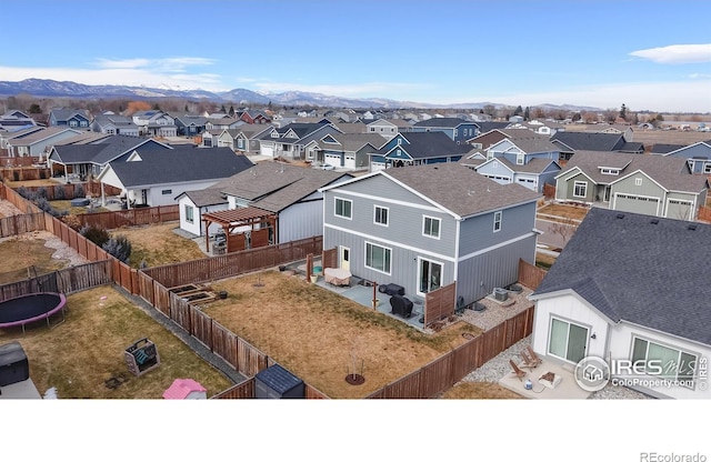 aerial view featuring a residential view and a mountain view