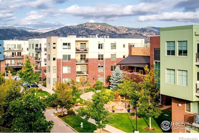 view of building exterior with a mountain view