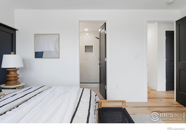 bedroom featuring light hardwood / wood-style flooring