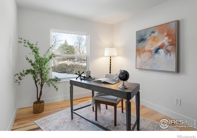 office featuring hardwood / wood-style floors