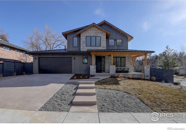 view of front of home featuring a garage and covered porch