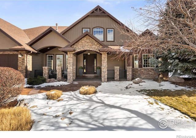 craftsman inspired home with a garage