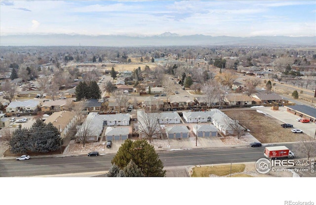 drone / aerial view featuring a mountain view