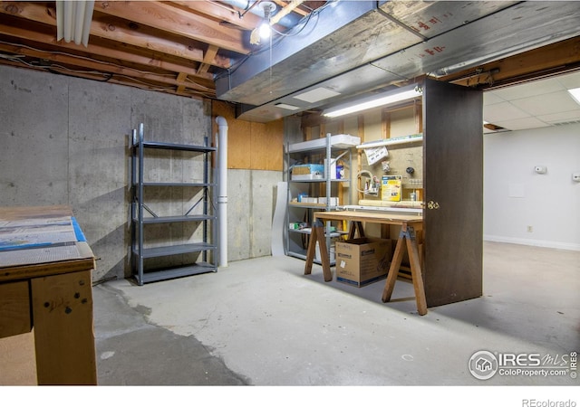 basement featuring a workshop area