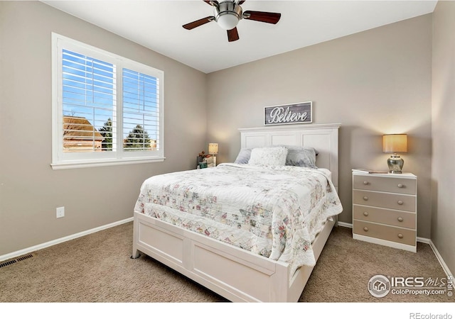 carpeted bedroom featuring ceiling fan