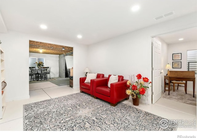 living room with light tile patterned floors