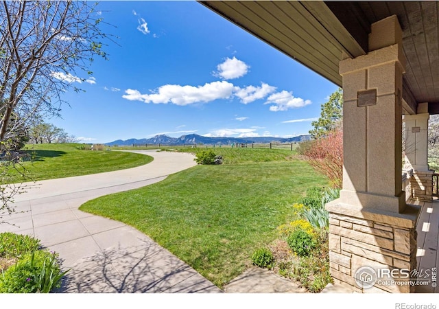 view of yard with a mountain view