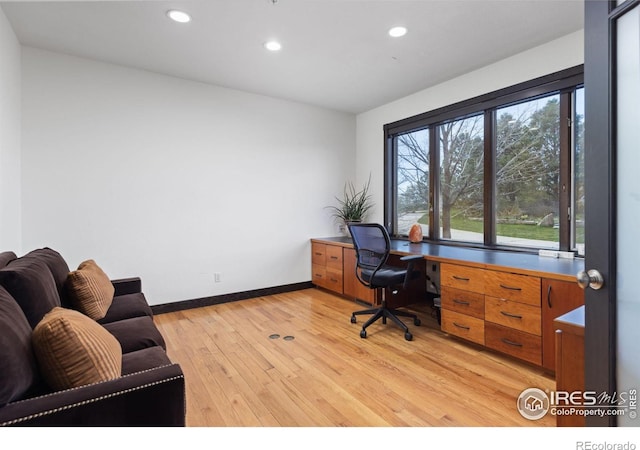 office area with light wood-type flooring