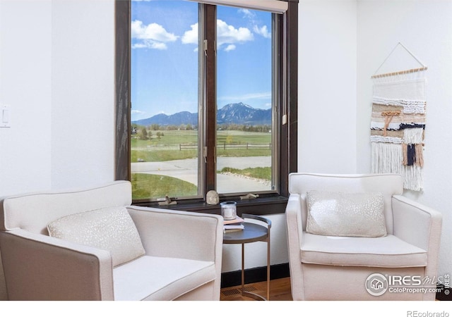 sitting room featuring a mountain view