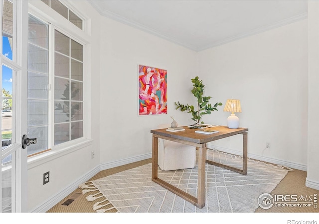 home office featuring crown molding