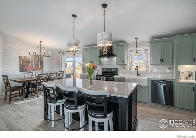 kitchen with dishwasher, sink, hanging light fixtures, green cabinets, and electric stove