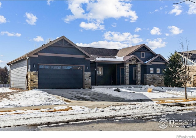 craftsman inspired home featuring a garage