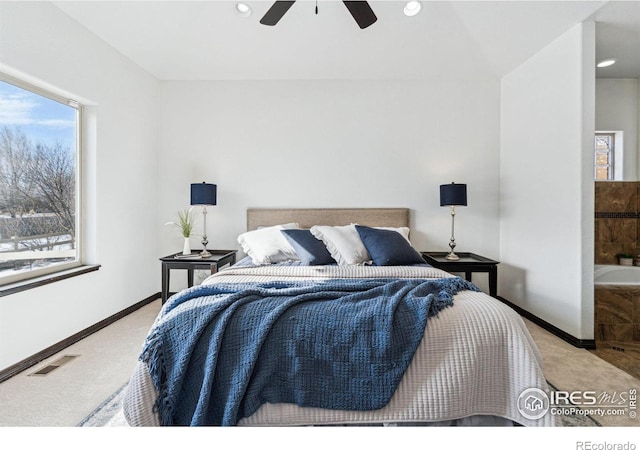 bedroom featuring light carpet and ceiling fan