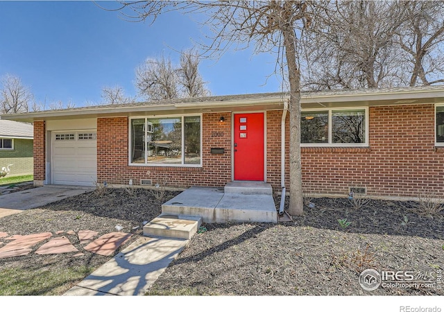 ranch-style home featuring a garage