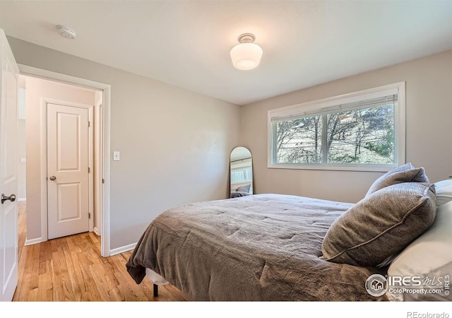 bedroom featuring light hardwood / wood-style floors