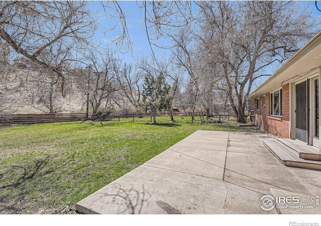 view of yard with a patio area