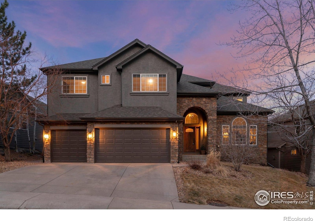 view of front of property featuring a garage