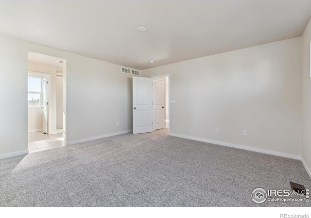 view of carpeted empty room