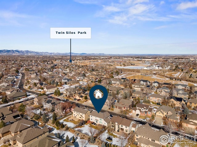 drone / aerial view featuring a mountain view