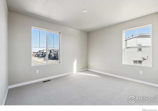 view of carpeted spare room