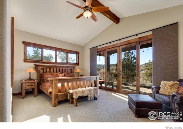 carpeted bedroom with access to exterior, lofted ceiling with beams, and ceiling fan