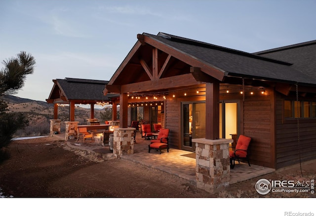 view of patio / terrace with a mountain view