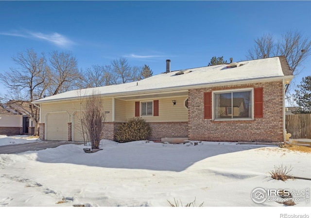 single story home featuring a garage