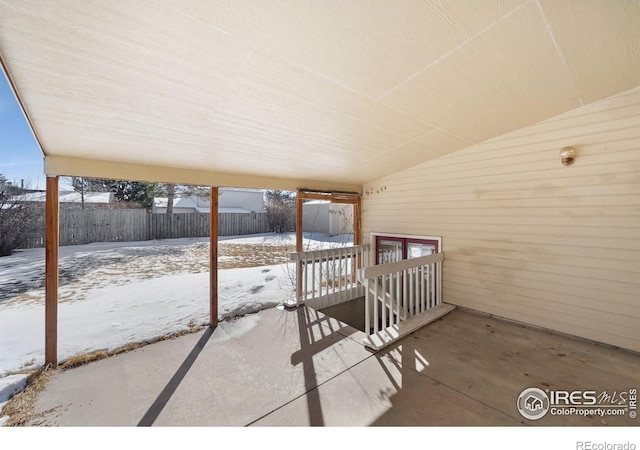 view of snow covered patio