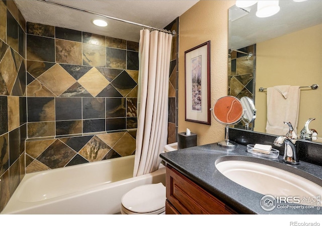 full bathroom featuring vanity, toilet, and shower / bath combo