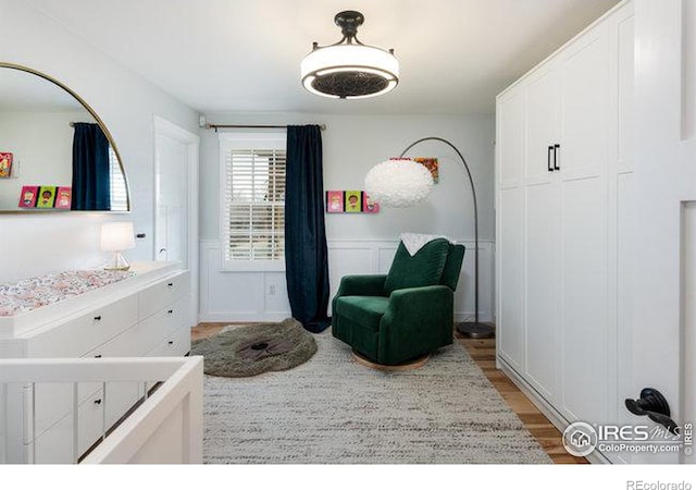 bedroom with light hardwood / wood-style floors