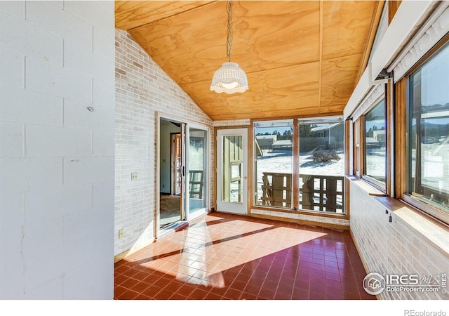 interior space featuring vaulted ceiling and wooden ceiling